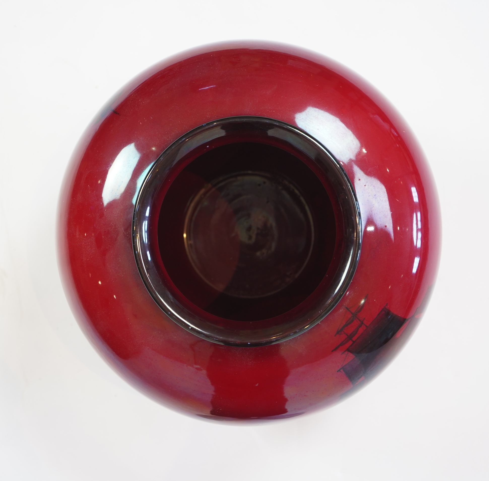 A large Doulton flambe vase decorated with ships, 29cm high